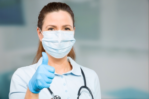 Nurse wearing a mask ans gloves